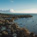 an aerial view of boats in the water