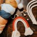 blue and orange yarn on brown wooden table